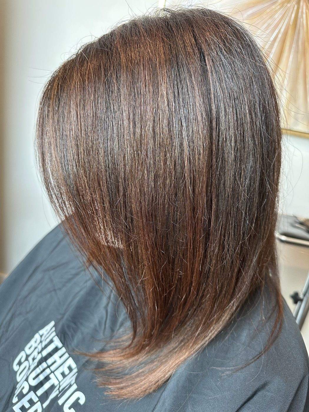 A custom-blended single-process color in warm, natural tones